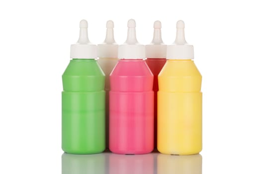 Bottles of paint isolated on a white background close up.