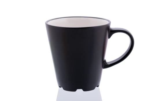 Black cup isolated on white background close up.