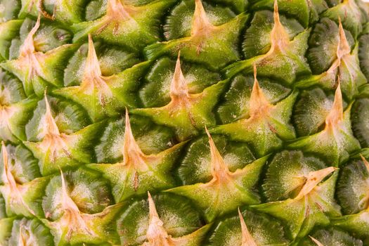Closeup on ripe pineapple, ananas fruit texture background