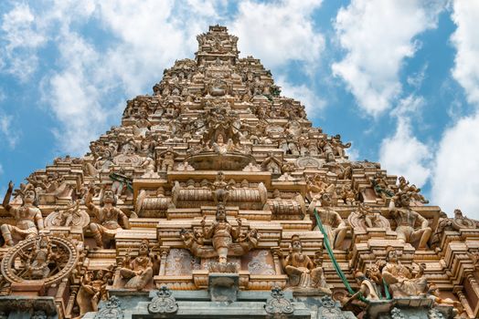 Facade of the big traditional tower (gopuram) of Hindu temple Matale Sri Muttu Mariyamman, Sri Lanka