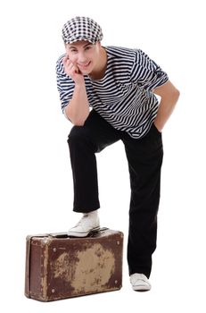 Full length stylish traveler man with vintage suitcase isolated on white background