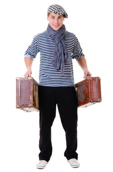 Full length stylish traveler man holding vintage suitcases isolated on white background