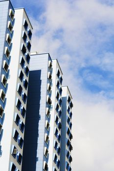 high rise apartments with sky background