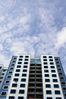 high rise apartments with sky background