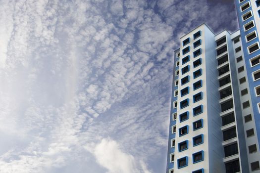 high rise apartments with clear blue sky