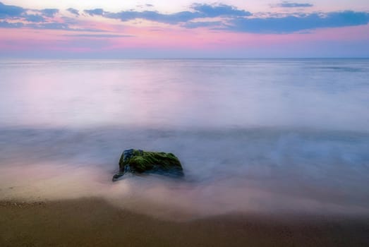 Beautiful seascape with orange warm sunrise, vacation concept