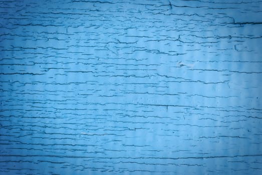 Old cracked painted texture. Rusty blue wood. Grunge background.