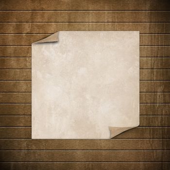 White paper with blank copyspace on textured background.