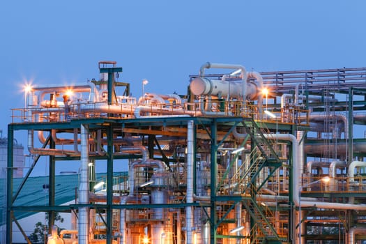 Chemical plant structure with lighting reflection