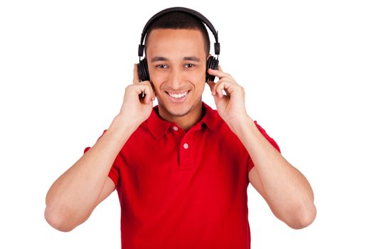 Black man having fun listening to music - isolated over a white background