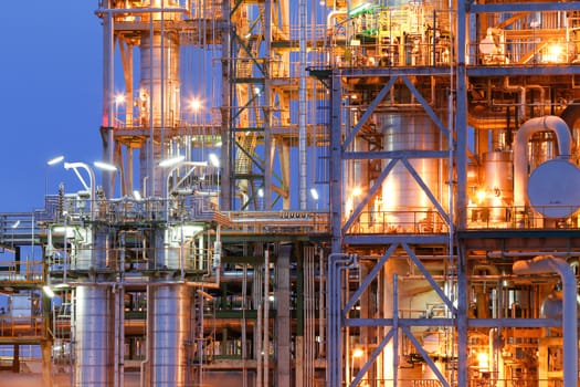 Chemical plant structure with lighting reflection