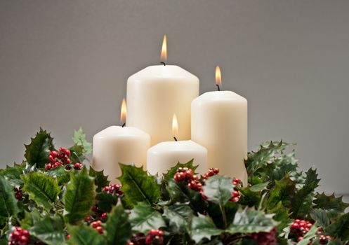 Advent wreath with burning candles for the pre Christmas time