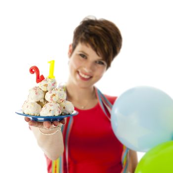 a birthday girl on her 18th birthday, holding a cake with a candle on a white background