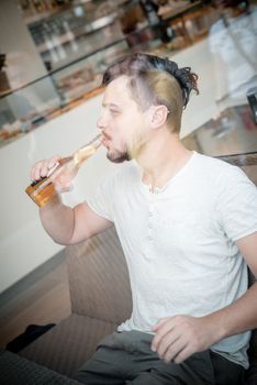 young stylish man in a bar