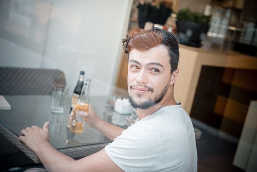 young stylish man in a bar