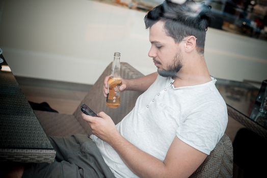 young stylish man in a bar