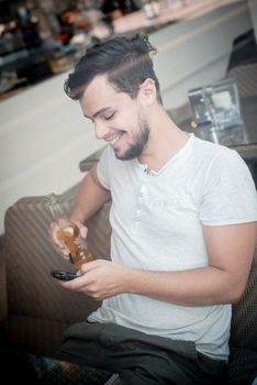 young stylish man in a bar