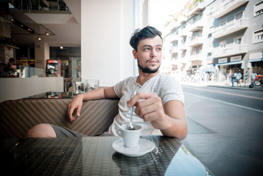 young stylish man in a bar