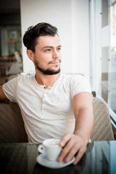 young stylish man in a bar