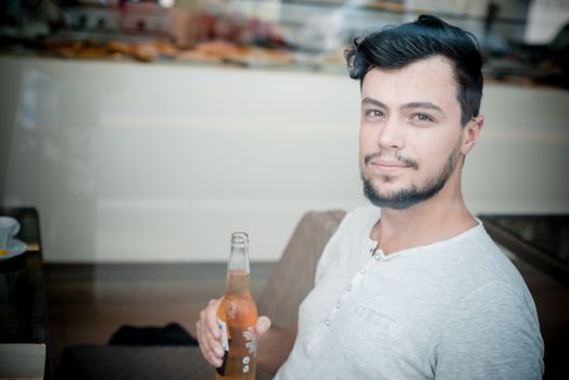 young stylish man in a bar