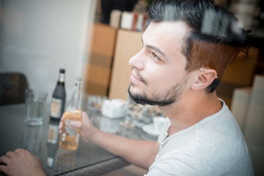 young stylish man in a bar