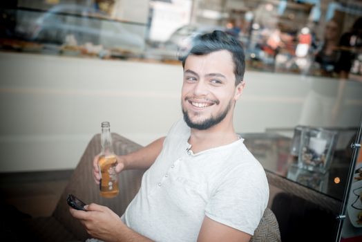 young stylish man in a bar