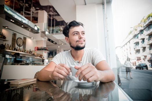 young stylish man in a bar