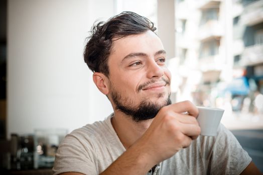 young stylish man in a bar