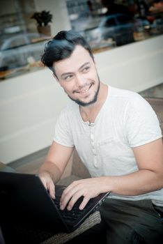 young stylish man in a bar