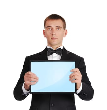 businessman in tuxedo holding tablet