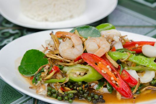 Fried herbal vegetables with mix seafood , Thai spicy cuisine
