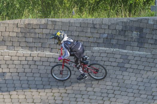My grandson is an active BMX cyclist, the pictures are shot in Aremark Municipality, Norway where the Bmx track is.