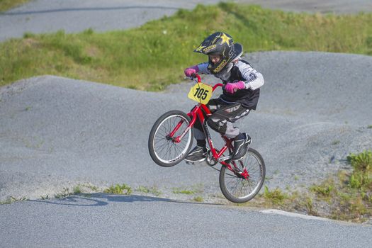My grandson is an active BMX cyclist, the pictures are shot in Aremark Municipality, Norway where the Bmx track is.