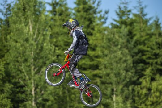 My grandson is an active BMX cyclist, the pictures are shot in Aremark Municipality, Norway where the Bmx track is.