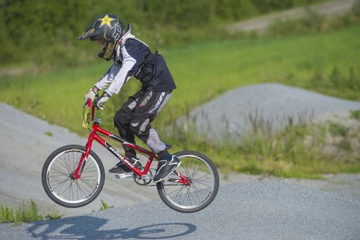 My grandson is an active BMX cyclist, the pictures are shot in Aremark Municipality, Norway where the Bmx track is.