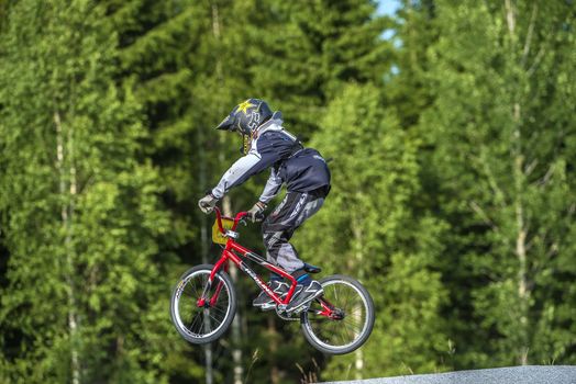 My grandson is an active BMX cyclist, the pictures are shot in Aremark Municipality, Norway where the Bmx track is.