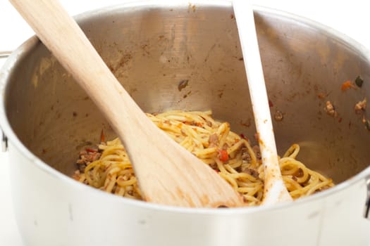 Cooking spaghetti bolognese for dinner