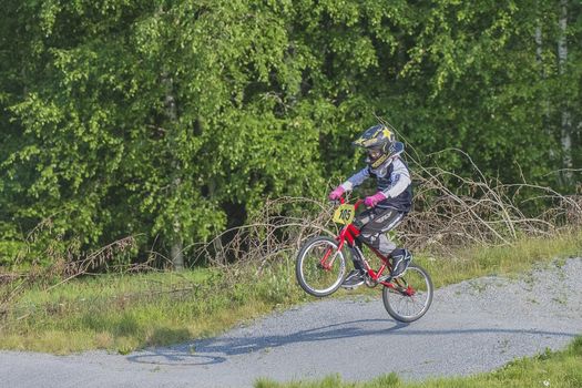 My grandson is an active BMX cyclist, the pictures are shot in Aremark Municipality, Norway where the Bmx track is.