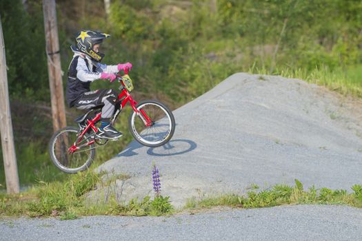 My grandson is an active BMX cyclist, the pictures are shot in Aremark Municipality, Norway where the Bmx track is.