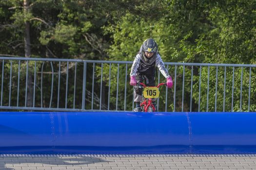 My grandson is an active BMX cyclist, the pictures are shot in Aremark Municipality, Norway where the Bmx track is.