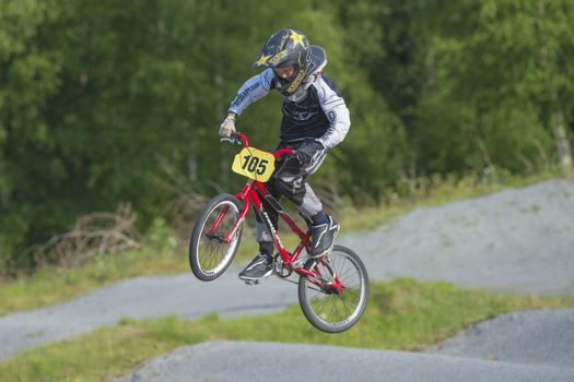 My grandson is an active BMX cyclist, the pictures are shot in Aremark Municipality, Norway where the Bmx track is.