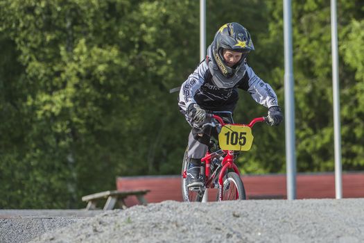 My grandson is an active BMX cyclist, the pictures are shot in Aremark Municipality, Norway where the Bmx track is.
