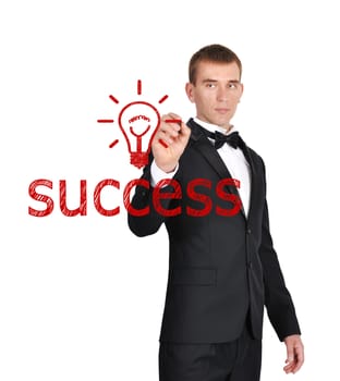 businessman in tuxedo drawing success symbol