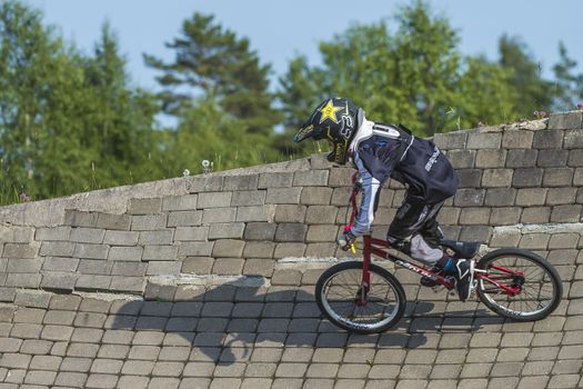My grandson is an active BMX cyclist, the pictures are shot in Aremark Municipality, Norway where the Bmx track is.