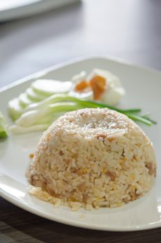 close up fried rice with pork  served with fresh vegetable