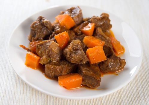 Arab dish, mutton and carrot in a plate ready to eat, Middle eastern food.