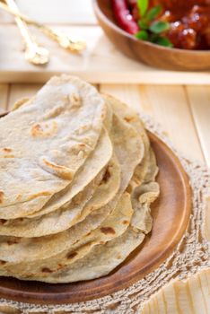 Chapati or chapatti, Indian chicken curry, popular Indian food.