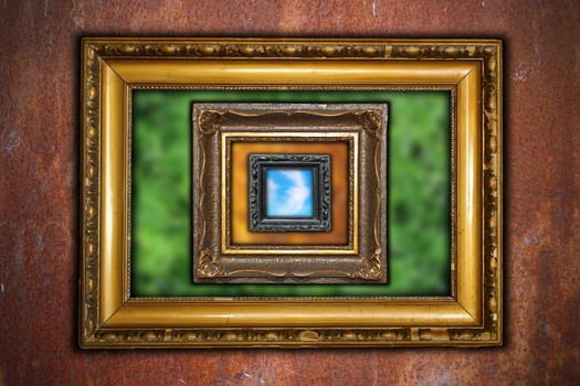 ancient carved wooden frames on industrial rusty wall backdrop - different out of focus backgrounds - summer, fall and sky