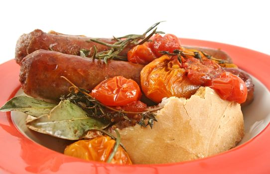 Delicious beef sausage and cherry tomato bake with rosemary.