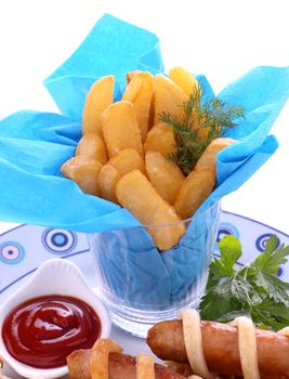 Fries sprinkled with rock salt with sausages wrapped in pastry.